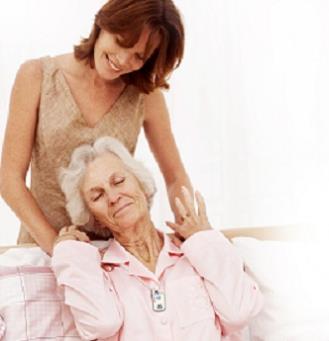 An elderly woman, shown here about to be strangled by a conventional doctor and/or pharmaceutical industry representative, is wearing an EmergenQi pendant