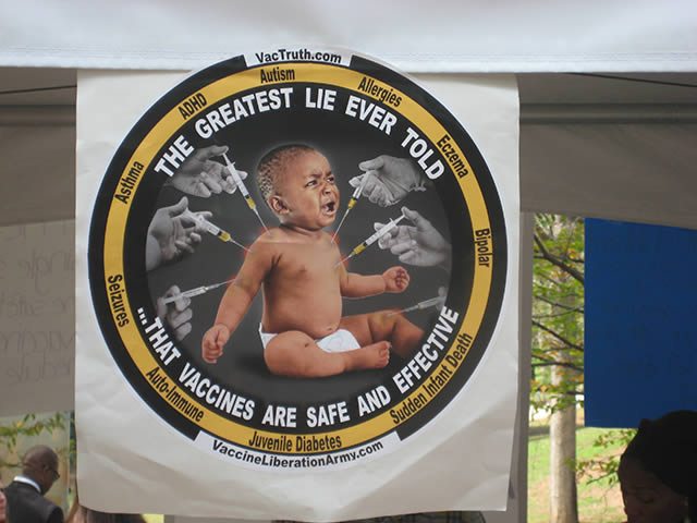 Antivaccine poster targeted at African-Americans. But don't call them antivaccine. They just have a poster picturing a crying baby boy being injected with numerous vaccines surrounded by logo proclaiming "the greatest lie ever told" to be that "vaccines are safe and effective." Don't you dare call them antivaccine.