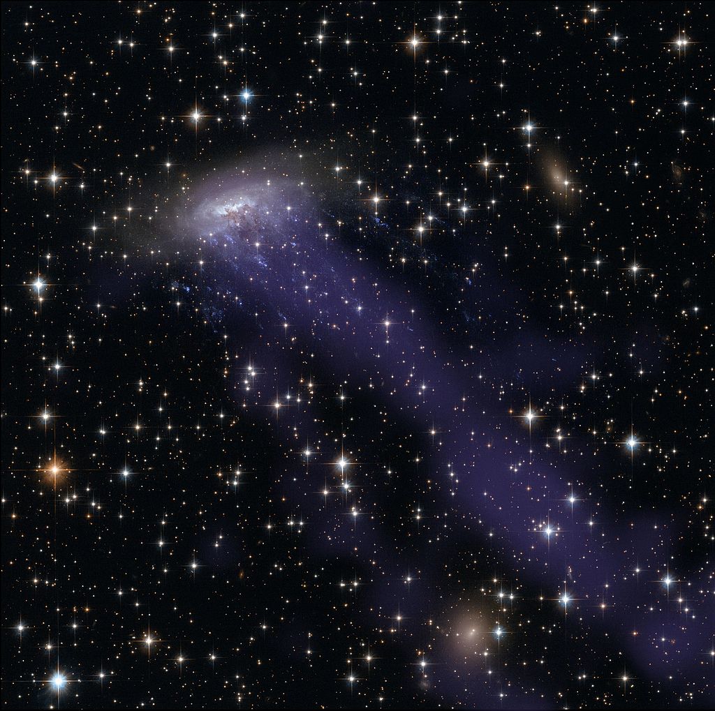 NASA's_Hubble_Finds_Life_is_Too_Fast,_Too_Furious_for_This_Runaway_Galaxy_(12952512944)
