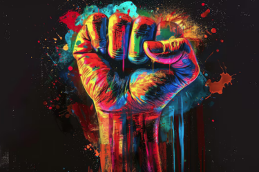 A vibrant, multicolored fist raised against a dark background, surrounded by splashes of blue, red, yellow, and orange paint, symbolizing strength and unity.