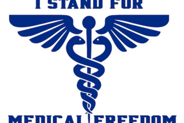 Blue text reads "I Stand for Medical Freedom" above and below a caduceus symbol with two snakes entwined around a winged staff, all in blue on a white background.