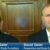 Two men in suits, identified as Dr. Mark Geier and David Geier, appear on a Fox 19 news broadcast. Both are seated indoors in front of a wooden cabinet and bookshelves, with name labels shown at the bottom.