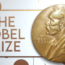 A large gold Nobel Prize medal featuring Alfred Nobel’s profile is displayed next to bold text reading "THE NOBEL PRIZE" on a white and gold background.