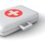 A white first aid kit box with a red circle and a white cross on the lid, placed on a white surface.