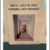A printed sign reads "May 6 – July 29, 2025 Farewell Boy Wonder" above a photo of a person with luggage walking down a hallway. The sign is taped to a surface.
