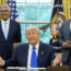 Former President Donald Trump sits at the Oval Office desk, gesturing with open hands, while two men in suits stand behind him smiling. Flags and official emblems are visible in the background.