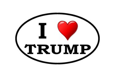 An oval bumper sticker with the text "I" followed by a red heart symbol and the word "TRUMP" in bold black letters, on a white background with a black border.