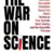 Book cover with large black text reading "The War on Science." A test tube replaces the "I" in "Science." Red text lists contributors and topics. Edited by Lawrence M. Krauss. White background.