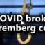 A noose hangs in a dimly lit room with the text “COVID broke Nuremberg code” in bold white letters across the image.