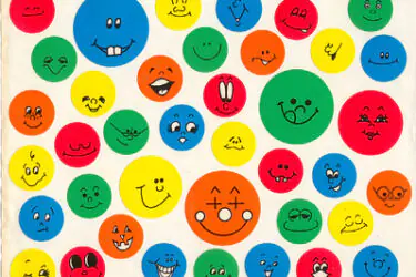 Colorful circles with various hand-drawn smiley faces in different expressions are scattered on a white background. The circles are blue, green, red, yellow, and orange.